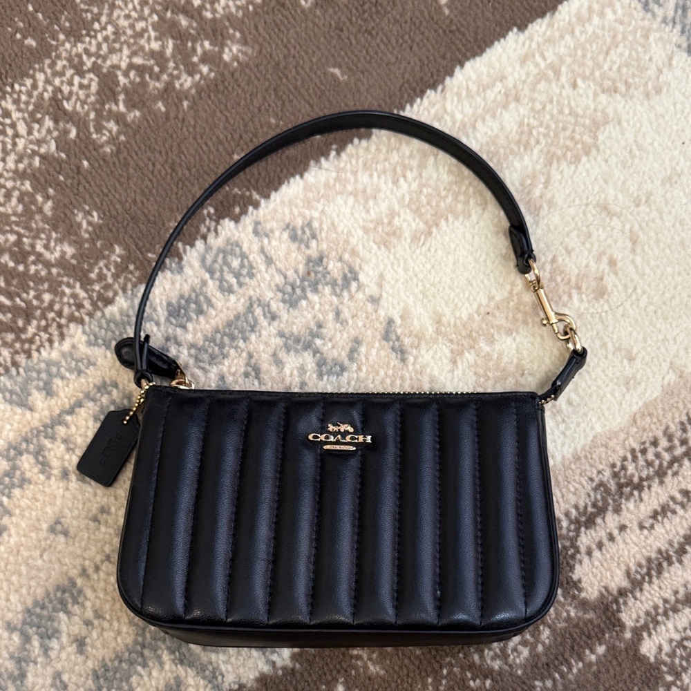 Coach Nolita 19